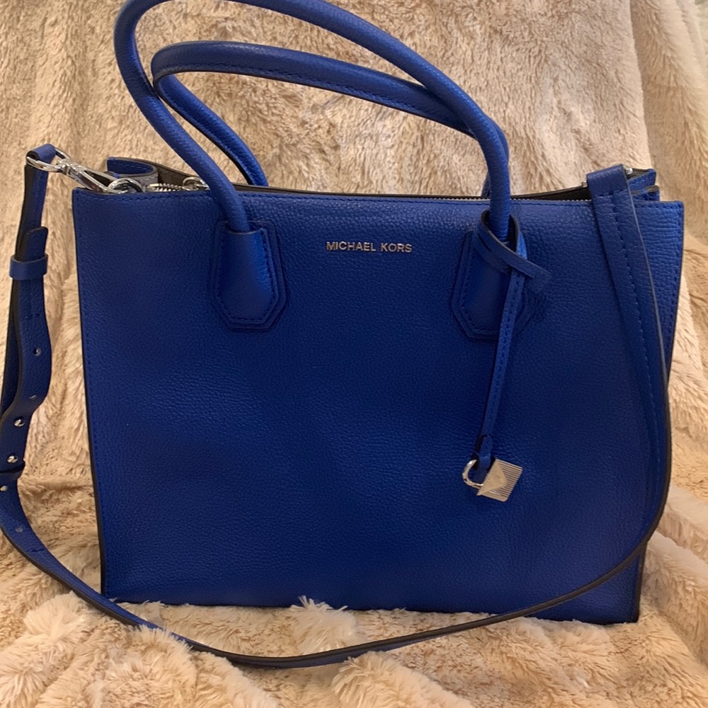 Brand new no tags. Blue medium size cross body